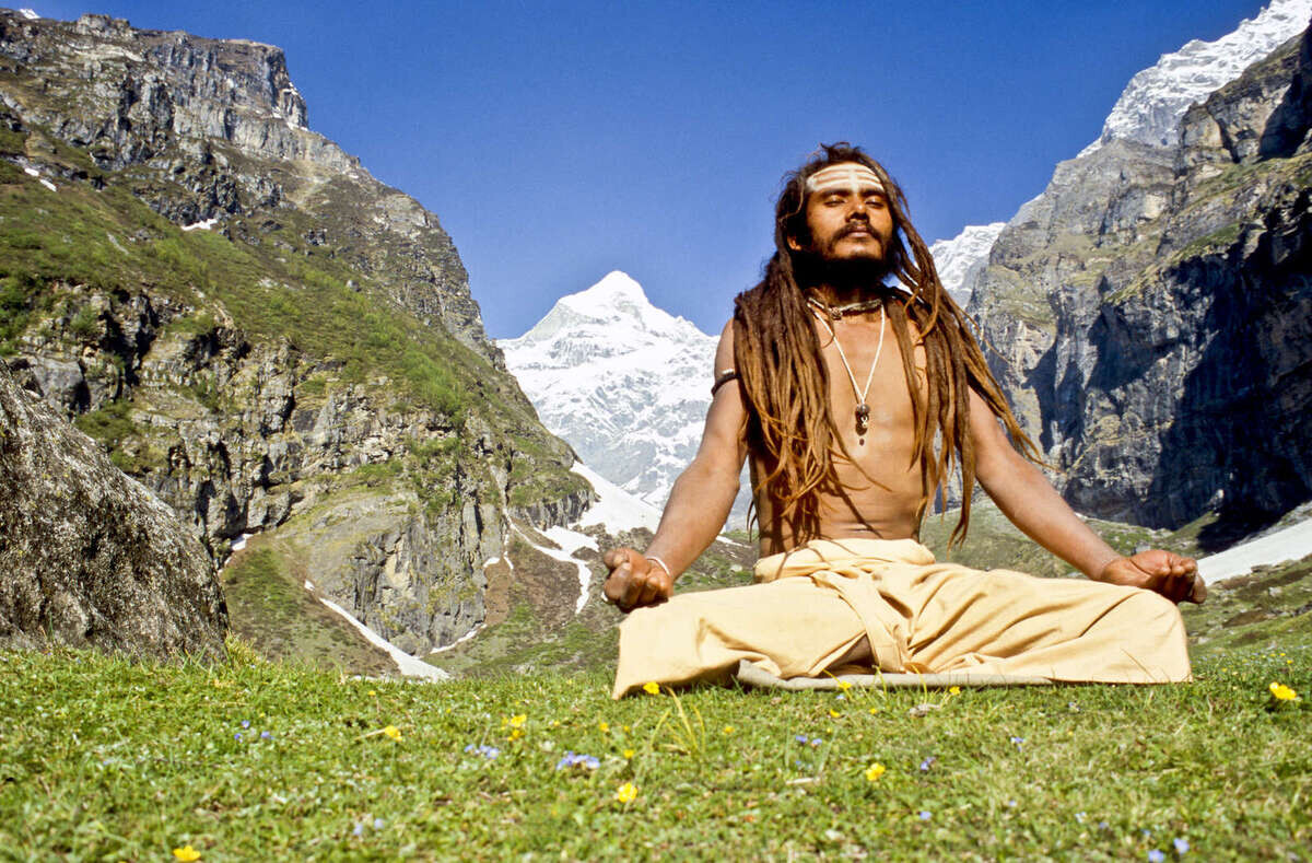 Shiva-Sadhu meditating next to his cave high above Badrinath